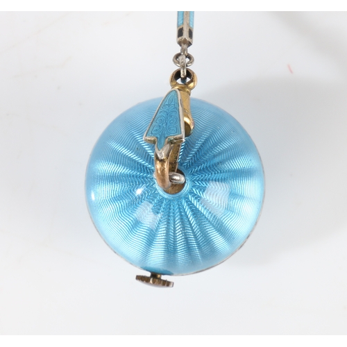 123 - A Continental silver and turquoise enamel orb form pendant watch and chain, the white dial with Arab... 