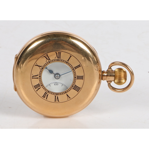 125 - An Edward VII 9ct gold half hunter pocket watch, the white enamel dial with Roman numerals, outer mi... 