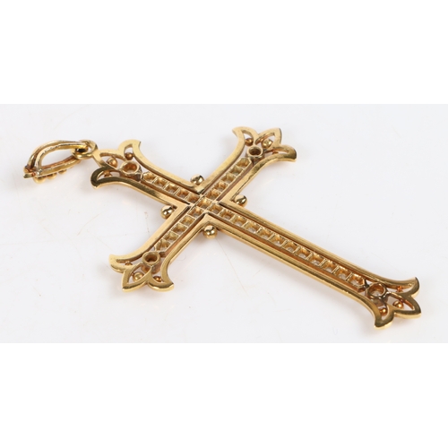 15 - A French gold and diamond mounted cross pendant, the beaded bail above a diamond set cross with tref... 