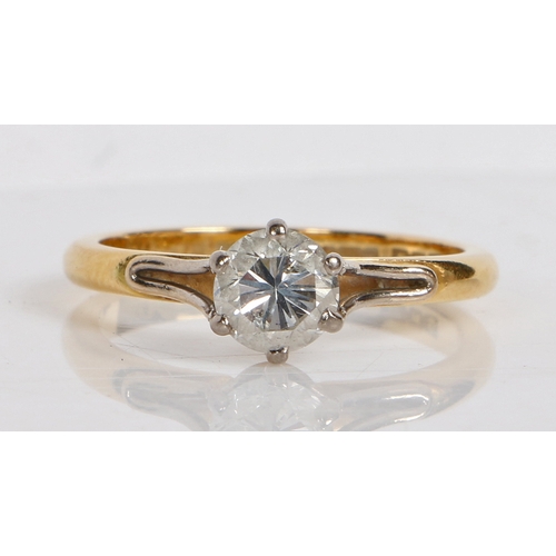 20 - An 18 carat gold and diamond solitaire ring, the single round brilliant cut diamond at 0.68ct approx... 