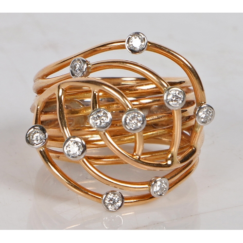 3 - Alessandro Pagani, An 18 carat gold and diamond set ring, the ring formed from eight gold bands inte... 