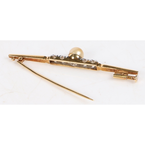 44 - An 18 carat gold bar brooch, set with a central pearl flanked by four diamonds, 51mm wide, 4.1g