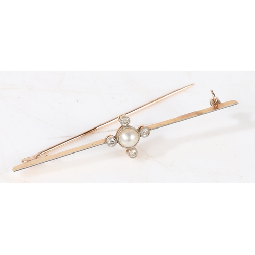 46 - A 15 carat gold and platinum set bar brooch, the central pearl flanked by four diamond chips, 62.7mm... 