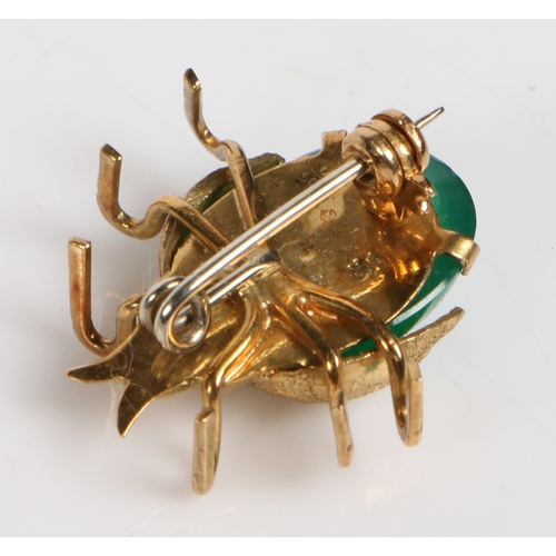 68 - An 18 carat gold and green paste ladybird brooch, modelled with wings spread, 20.6mm wide, 20mm high... 