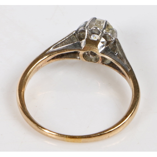 85 - A 9 carat gold and diamond engagement ring, the central oval cut diamond measuring approximately 0.4... 