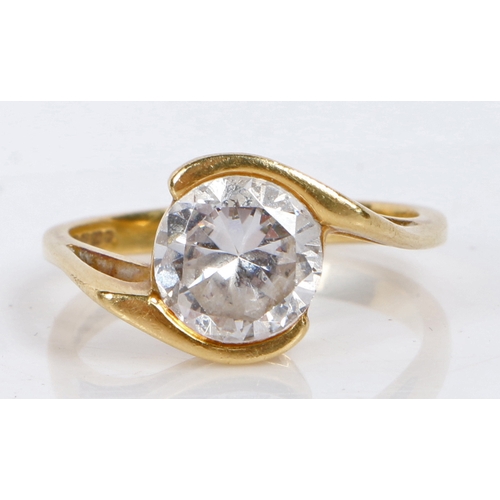 88 - An 18 carat gold and cubic zirconia ring, the central cubic zirconia with wrap-around style mount, r... 