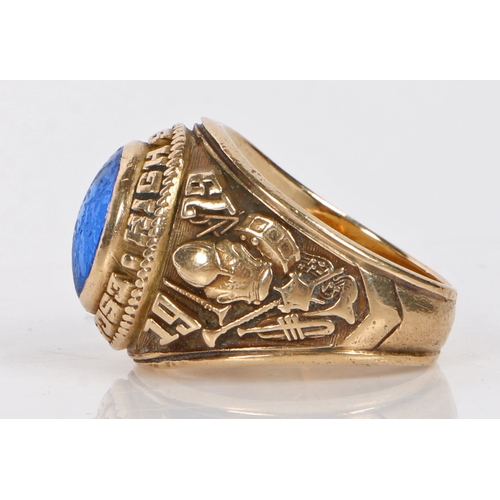 93 - An American 10 carat gold College style ring, the oval blue paste set head with inscription 