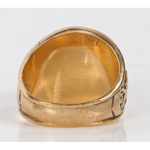 93 - An American 10 carat gold College style ring, the oval blue paste set head with inscription 