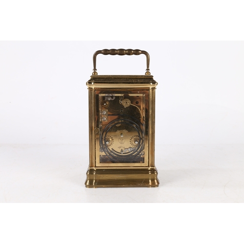 102 - A 20TH CENTURY BRASS REPEATING CARRIAGE CLOCK BY ANGELUS, FRENCH. A 20th Century brass carriage cloc... 