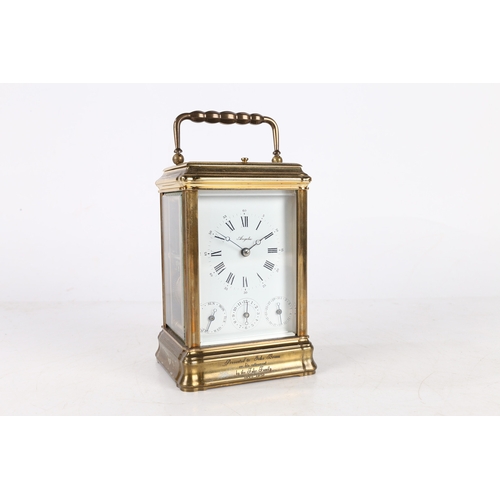 102 - A 20TH CENTURY BRASS REPEATING CARRIAGE CLOCK BY ANGELUS, FRENCH. A 20th Century brass carriage cloc... 