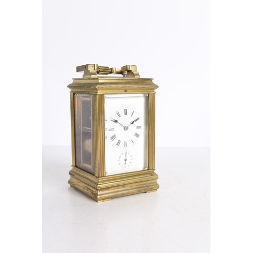 111 - A LATE 19TH CENTURY BRASS CASED REPEATING CARRIAGE CLOCK. A Late 19th century brass cased repeating ... 