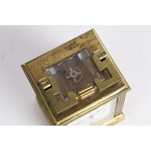 111 - A LATE 19TH CENTURY BRASS CASED REPEATING CARRIAGE CLOCK. A Late 19th century brass cased repeating ... 