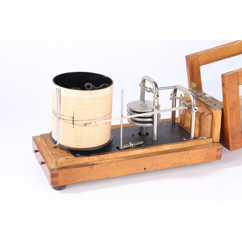 115 - A 20TH CENTURY RUSSIAN BAROGRAPH. A 20th century Russian barograph, housed within a wooden case with... 