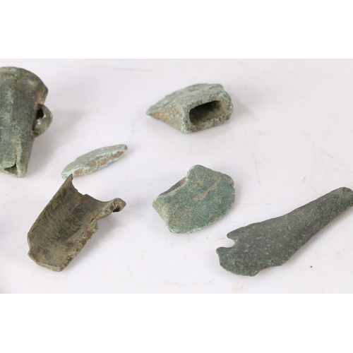 12 - BRONZE AGE DETECTING AND FIELD WALKING FINDS. To include axe sections and a chisel section, (8).