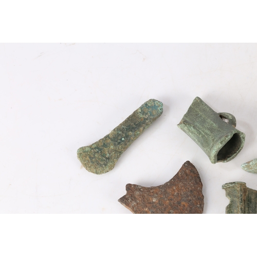 12 - BRONZE AGE DETECTING AND FIELD WALKING FINDS. To include axe sections and a chisel section, (8).