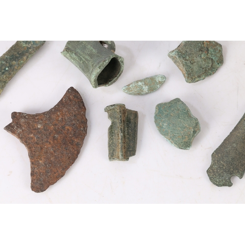 12 - BRONZE AGE DETECTING AND FIELD WALKING FINDS. To include axe sections and a chisel section, (8).