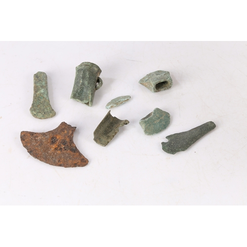 12 - BRONZE AGE DETECTING AND FIELD WALKING FINDS. To include axe sections and a chisel section, (8).