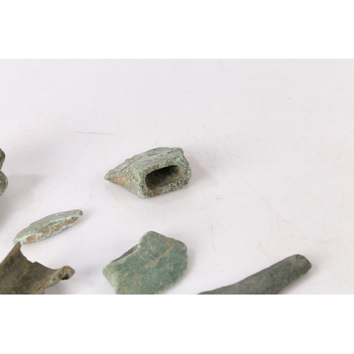 12 - BRONZE AGE DETECTING AND FIELD WALKING FINDS. To include axe sections and a chisel section, (8).