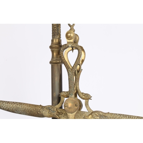 124 - A LARGE PAIR OF 19TH/20TH CENTURY BRASS SCALES. A large pair of 19th/20th century brass scales, the ... 