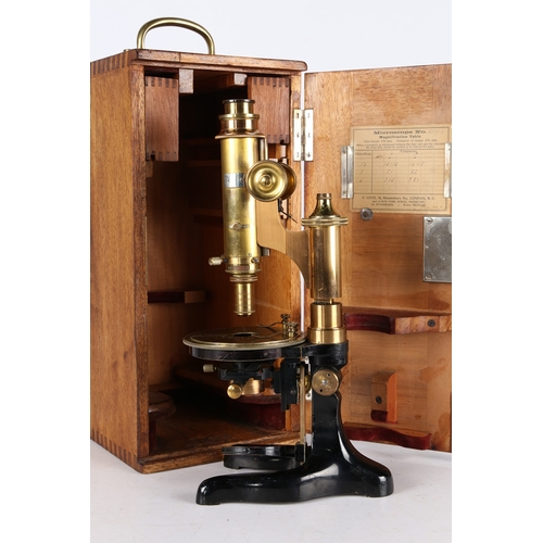 127 - A LEITZ WETZLER 165904 MICROSCOPE. A Leitz Wetzler 165904 microscope, brass mounted with black lacqu... 