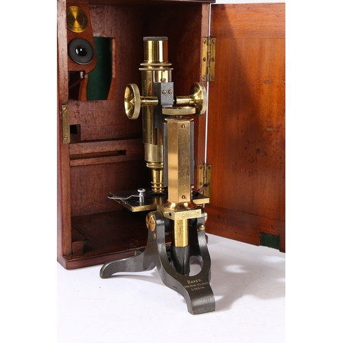 129 - A 19TH CENTURY MICROSCOPE BY BAKER. A 19th century Microscope by Baker, brass and black lacquered ho... 