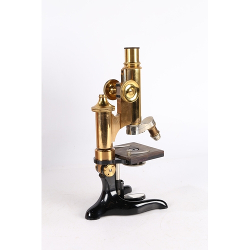 134 - A E LEITZ WETZLAR NO104629 MICROSCOPE. A E Leitz Wetzlar No104629 microscope, brass and black lacque... 