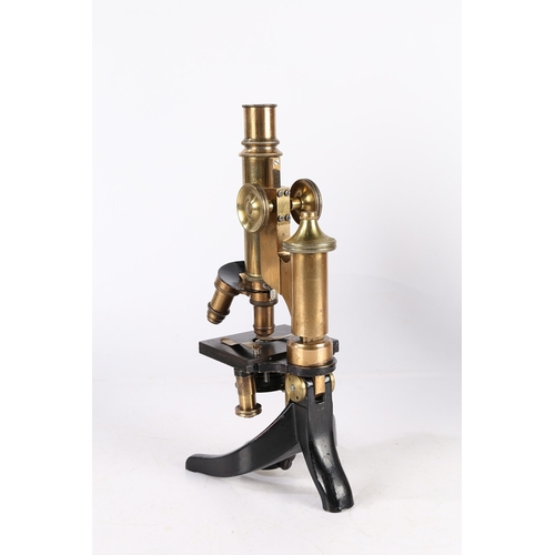 136 - A E LEITZ MICROSCOPE. A E Leitz microscope, brass and black lacquered, housed within a fitted case 3... 