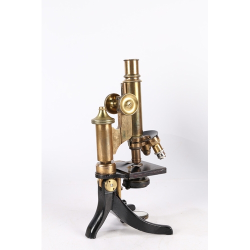 136 - A E LEITZ MICROSCOPE. A E Leitz microscope, brass and black lacquered, housed within a fitted case 3... 