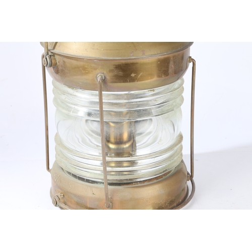 139 - AN EARLY 20TH CENTURY BRASS SHIPS LANTERN. An Early 20th century brass ships lantern, stamped 