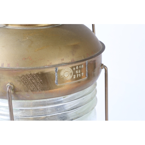 139 - AN EARLY 20TH CENTURY BRASS SHIPS LANTERN. An Early 20th century brass ships lantern, stamped 