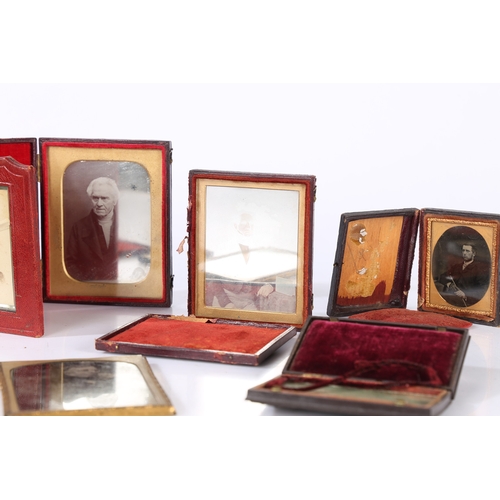 141 - A COLLECTION OF DAGUERREOTYPES AND AMBROTYPES. To include a cased daguerreotype of a seated gentlema... 