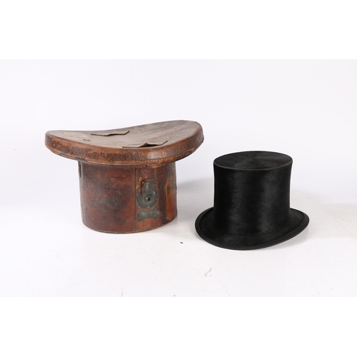 144 - A LATE VICTORIAN/EARLY EDWARDIAN TOP HAT WITH A LEATHER FITTED CASE. A Late Victorian/Early Edwardia... 