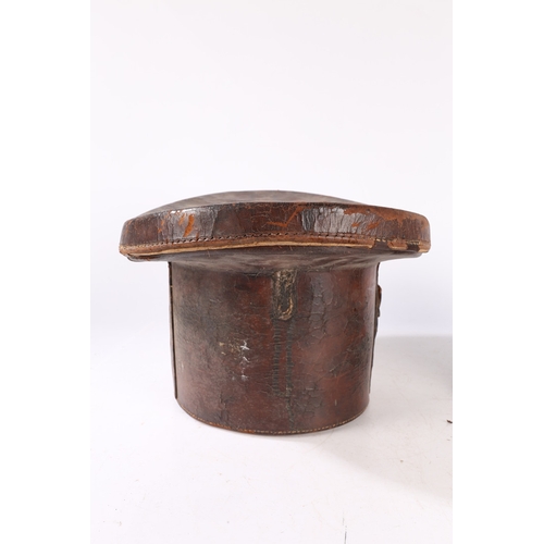 144 - A LATE VICTORIAN/EARLY EDWARDIAN TOP HAT WITH A LEATHER FITTED CASE. A Late Victorian/Early Edwardia... 