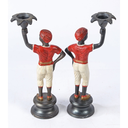 146 - A PAIR OF 20TH CENTURY COLD PAINTED BRONZE 'BLACKAMOOR' FIGURAL CANDLESTICKS, 27CM HIGH (2). A pair ... 