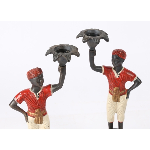 146 - A PAIR OF 20TH CENTURY COLD PAINTED BRONZE 'BLACKAMOOR' FIGURAL CANDLESTICKS, 27CM HIGH (2). A pair ... 