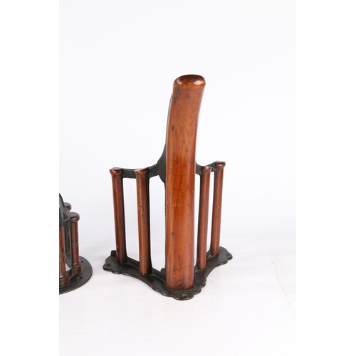 158 - TWO LATE VICTORIAN MUSGARVE OF BELFAST TEAK AND CAST IRON SADDLE RACK AND HARNESS RACK. Two Late Vic... 