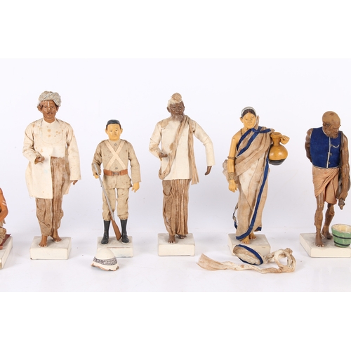 166 - A SET OF SEVEN LATE 19TH/EARLY 20TH CENTURY INDIAN CLAY FIGURES. A set of Seven Indian clay figures,... 