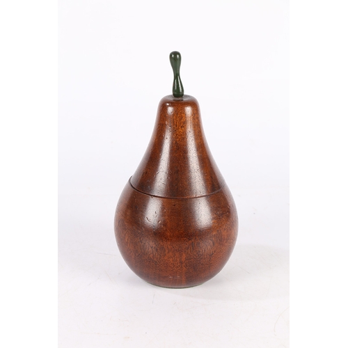 167 - AN EARLY 20TH CENTURY OAK TEA CADDY IN THE FORM OF A PEAR. An Early 20th century oak tea caddy in th... 