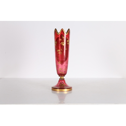 175 - A 19TH CENTURY BOHEMIAN RUBY GLASS VASE. A 19th century Bohemian ruby glass vase, decorated with a p... 