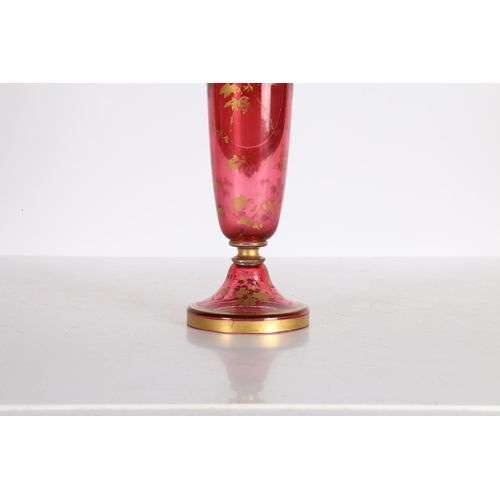 175 - A 19TH CENTURY BOHEMIAN RUBY GLASS VASE. A 19th century Bohemian ruby glass vase, decorated with a p... 