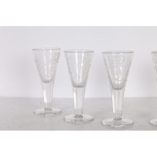 176 - A SET OF SIX SPIRIT GLASSES ENGRAVED WITH CHARLES XII OF SWEDEN MONOGRAM (6). These glasses were sup... 