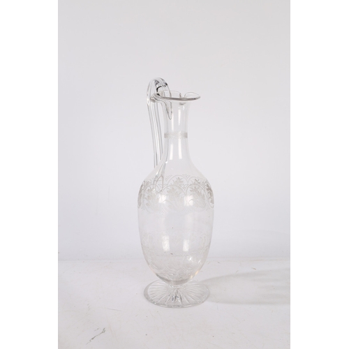 180 - A VICTORIAN STOURBRIDGE GLASS CLARET JUG, CIRCA 1860. With acid etched stylised flowers, 31cm tall.