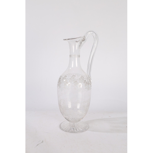 180 - A VICTORIAN STOURBRIDGE GLASS CLARET JUG, CIRCA 1860. With acid etched stylised flowers, 31cm tall.