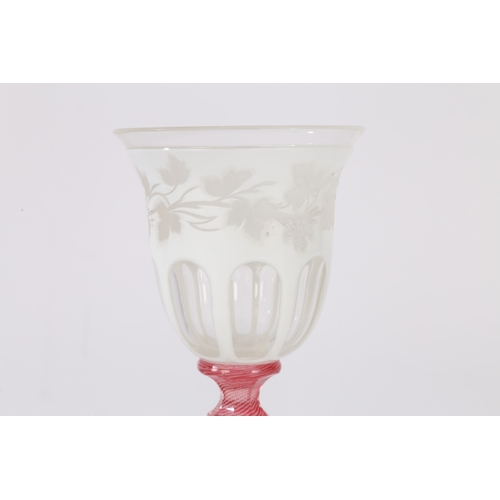 181 - A MID 19TH CENTURY AUSTRIAN BOHEMIAN GLASS GOBLET, CIRCA 1840-50. Having a white overlaid bowl with ... 