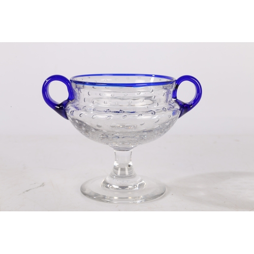 186 - A SAINT LOUIS BUBBLE GLASS BOWL, FRENCH, CIRCA 1926. With blue rim and twin handles, designed by Pau... 