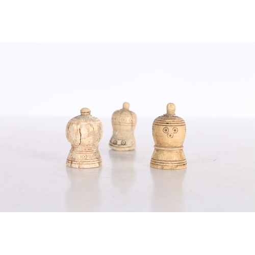 21 - THREE PERSIAN BONE CHESS PIECES, CIRCA 1000-1200 AD. Three Persian bone chess pieces, circa 10th-12t... 