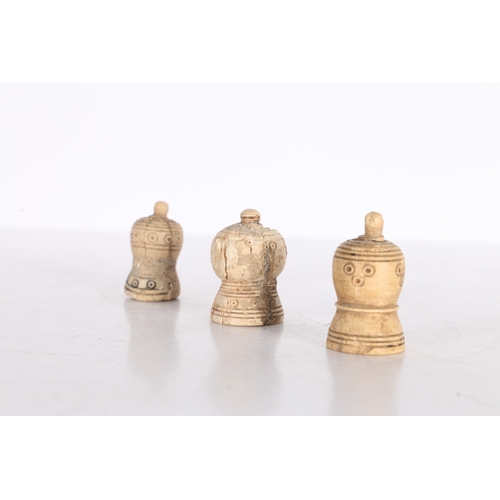 21 - THREE PERSIAN BONE CHESS PIECES, CIRCA 1000-1200 AD. Three Persian bone chess pieces, circa 10th-12t... 