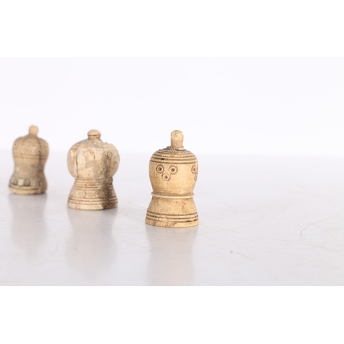 21 - THREE PERSIAN BONE CHESS PIECES, CIRCA 1000-1200 AD. Three Persian bone chess pieces, circa 10th-12t... 