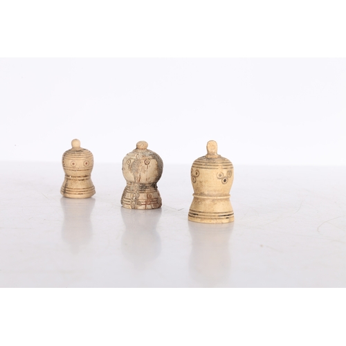 21 - THREE PERSIAN BONE CHESS PIECES, CIRCA 1000-1200 AD. Three Persian bone chess pieces, circa 10th-12t... 