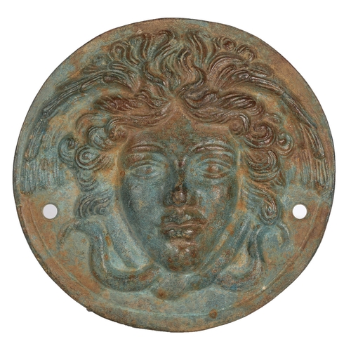 26 - AFTER THE ROMAN A BRONZE PHALERA OF MEDUSA. After the Roman a Bronze Phalera of Medusa, of circular ... 